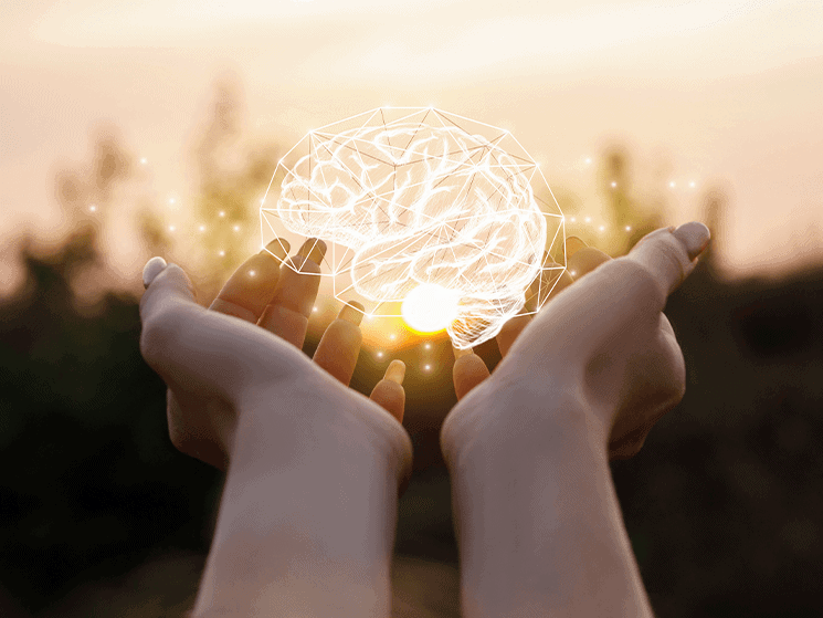 Mains tendues avec l'icône d'un cerveau au centre, connotant l'hypnose pratiquée par Christel Dijoux, praticienne en hypnose à Rimont, en Ariège.
